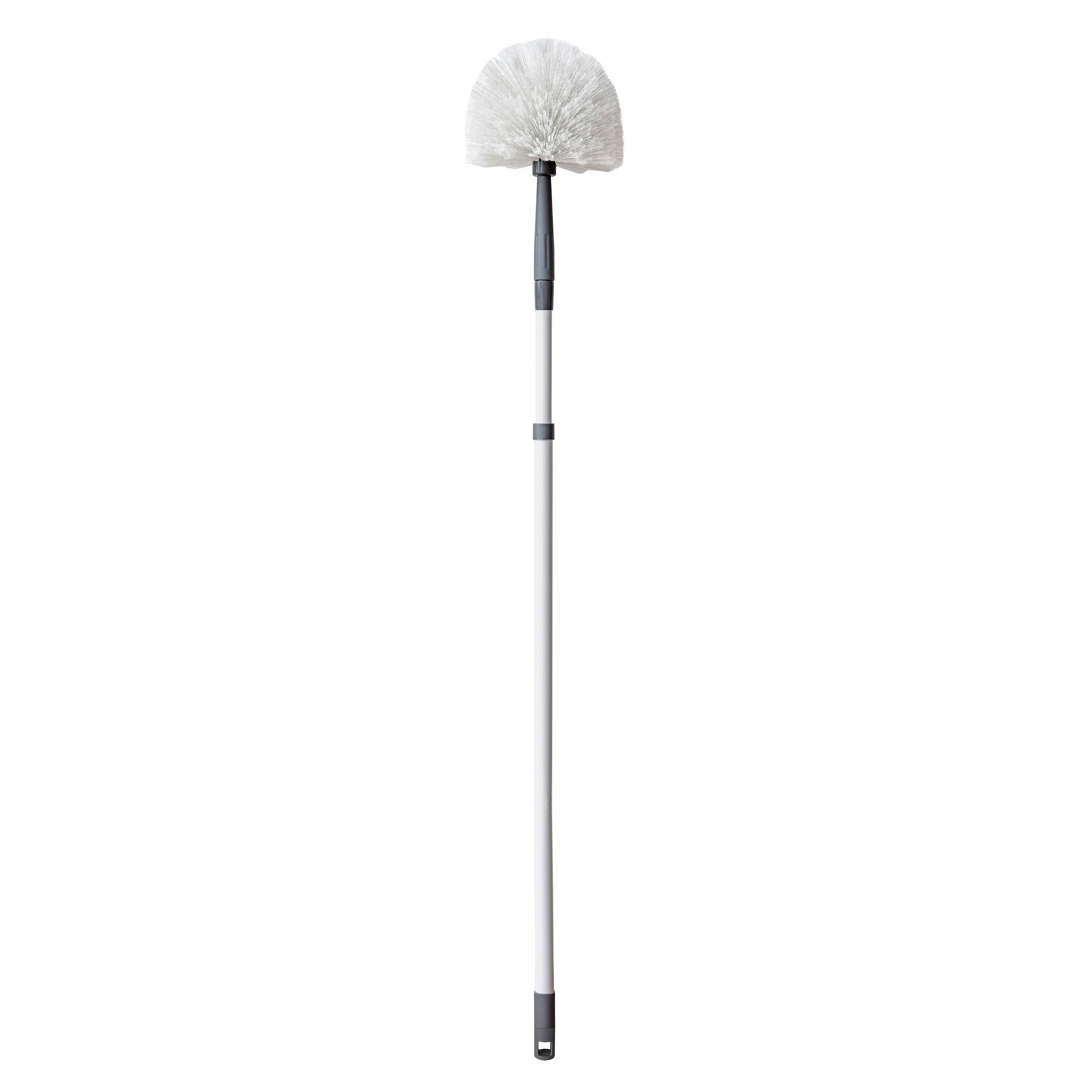 White cobweb broom or brush on a white background. Simply Clean Cobweb Broom
