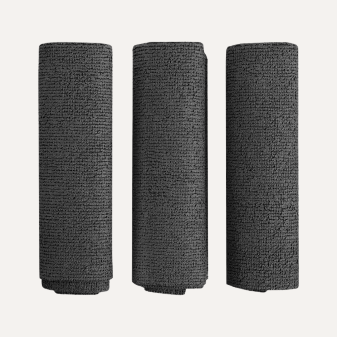 Three rolls of black textured paper on a white background. Simply Clean Microfibre Chamois