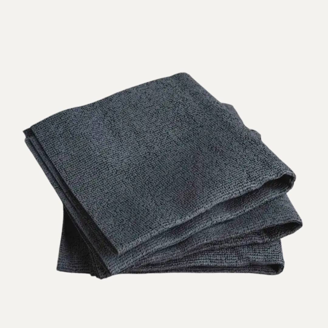 Folded dark gray towel on a white background. Simply Clean Microfibre Chamois