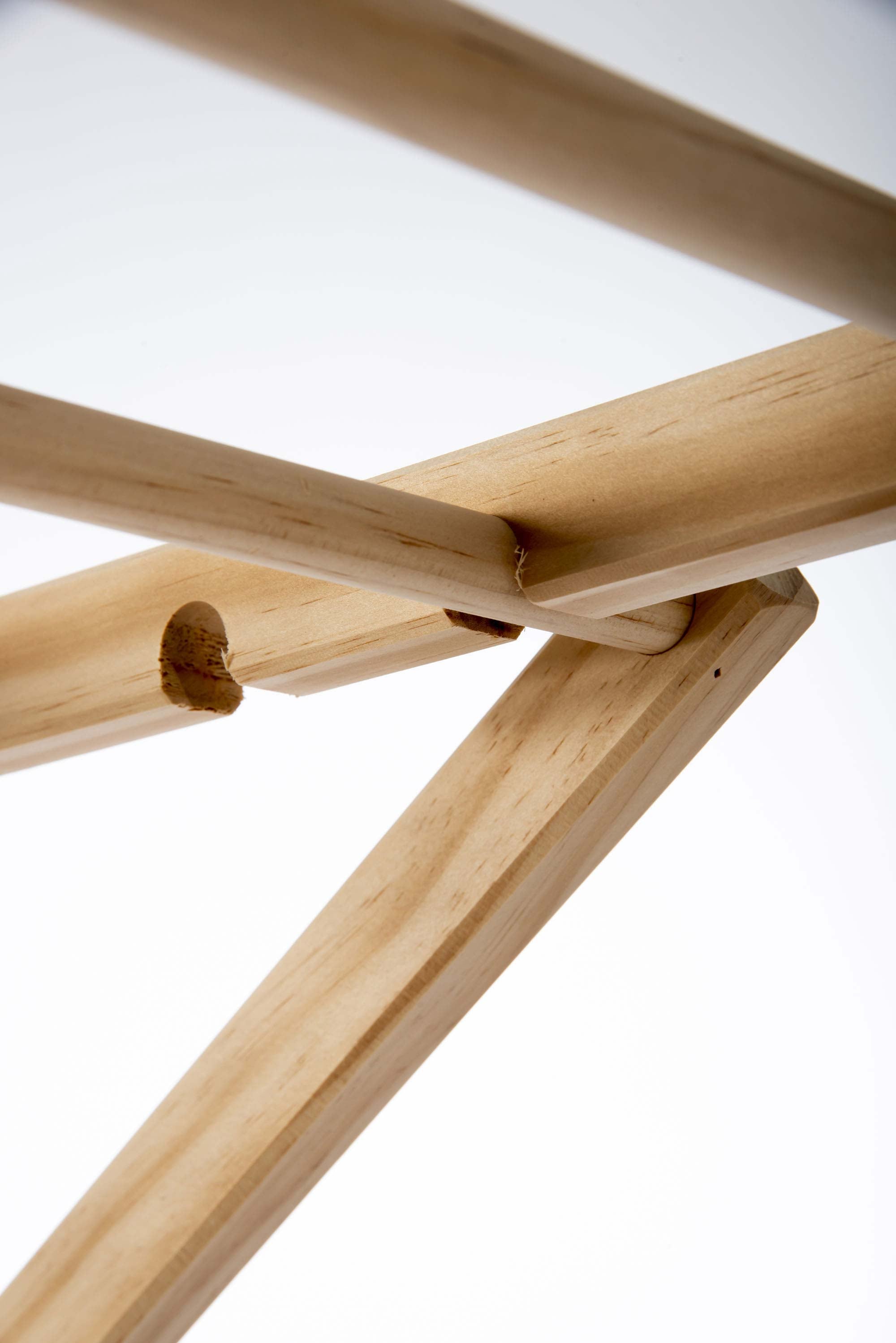 Close-up of a wooden clothes airer frame on a white background. Victoria James Home Eco Deluxe Clothes Airer