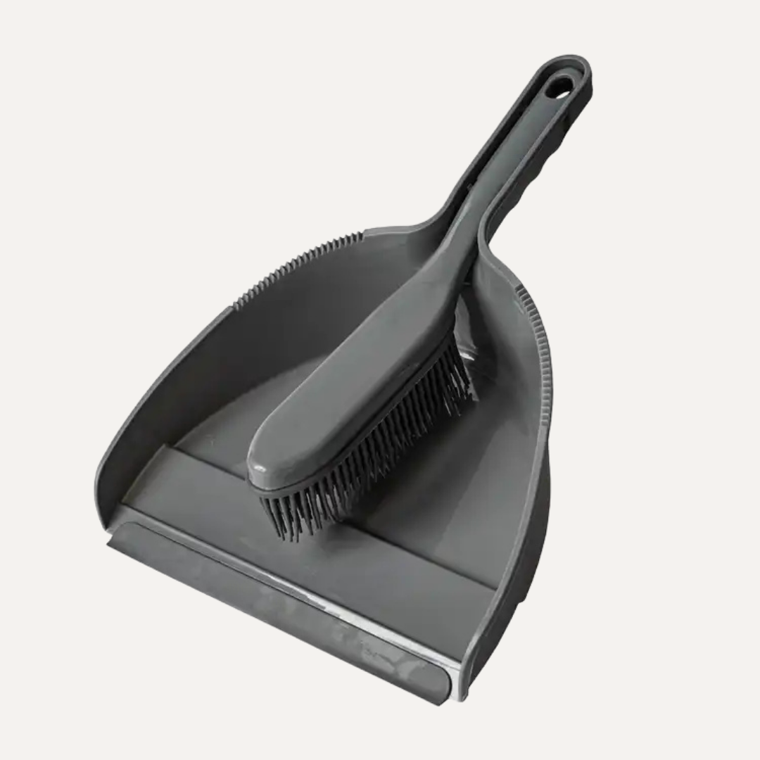 Gray dustpan and brush set on a white background. Simply Clean Rubber Head Hand Brush and Dustplan